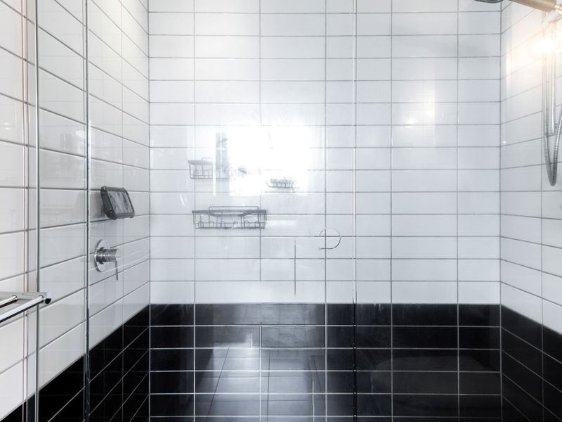 Indulge in a refreshing shower experience with a sleek, modern design that combines style and functionality for the perfect start to your day.