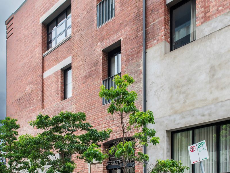 Nestled in a quiet pocket, this modern Richmond apartment building offers the best of both worlds — serene yet steps away from vibrant Swan Street.