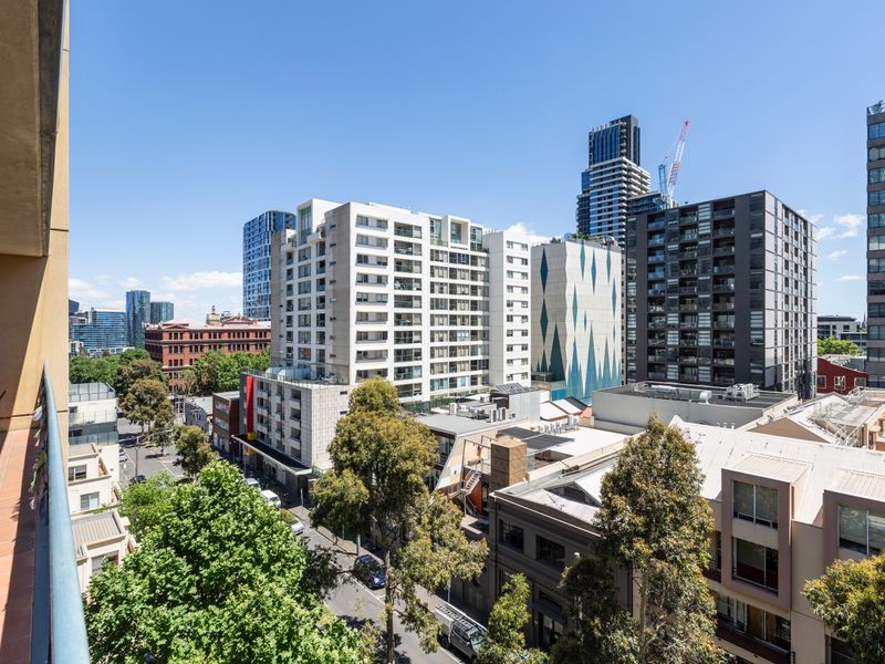 Elevated balcony view overlooking the surrounding neighbourhood and city skyline.