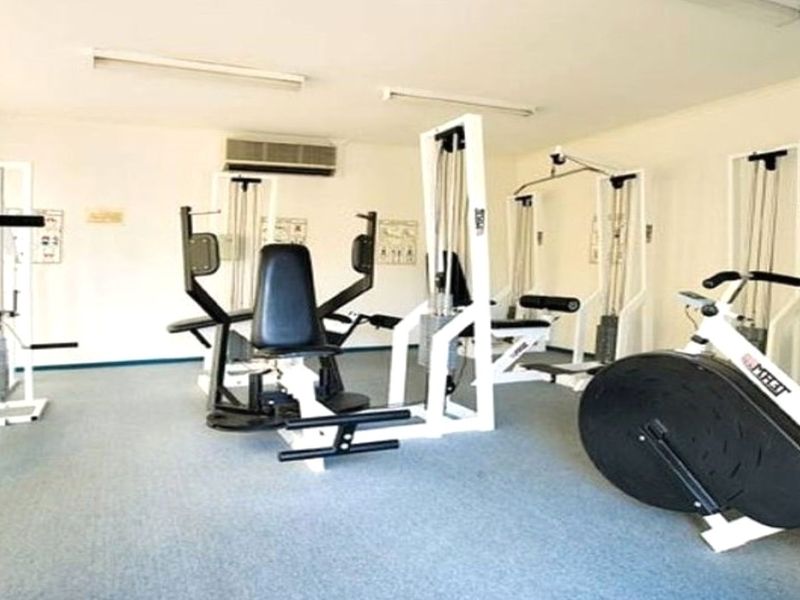 Tranquil 2-Bed Apartment with Pool and Gym Access