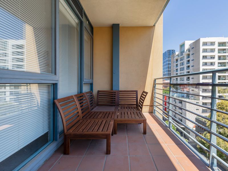 Private balcony with outdoor seating, perfect for enjoying morning coffee or evening drinks.