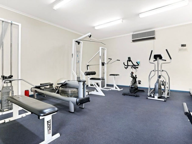 On site gym equipped with cardio machines and strength equipment.