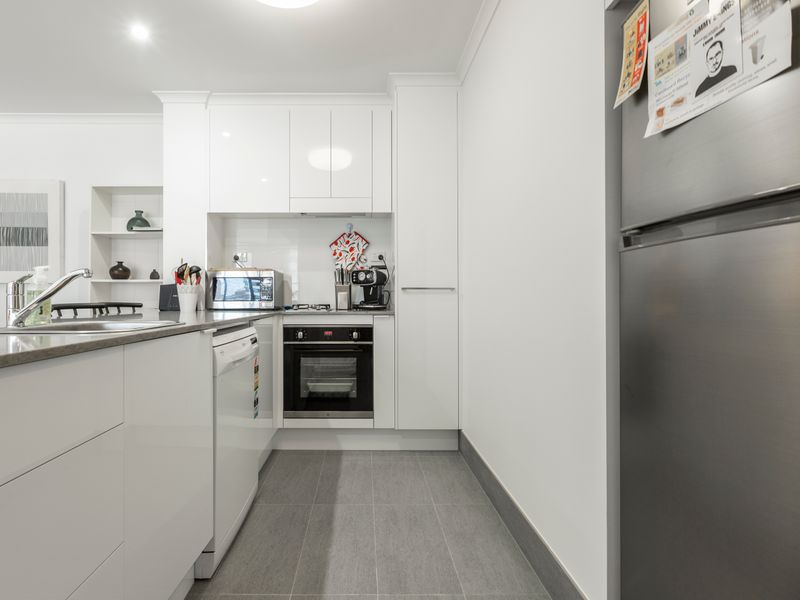 Well equipped kitchen with ample bench space, stainless steel appliances and everything needed for cooking during your stay.