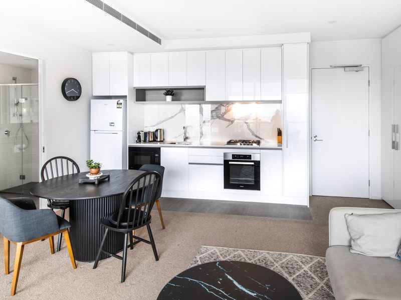 Modern dining and living space designed for comfort and relaxation.