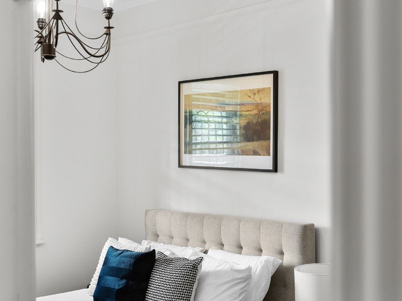 Wake up refreshed in this stylish bedroom.