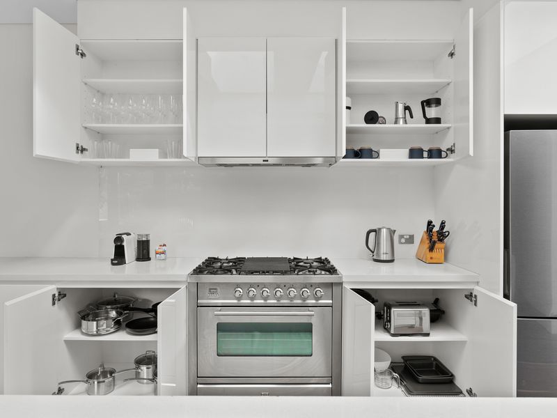 Modern and Sleek Kitchen – Fully equipped for all your cooking needs with premium appliances.
