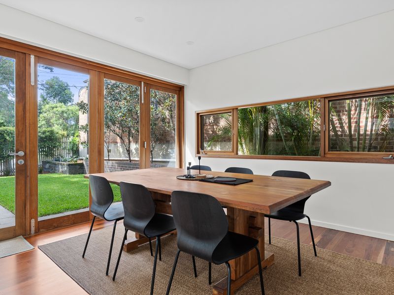 Enjoy meals in the spacious dining area, just steps from your private courtyard garden.