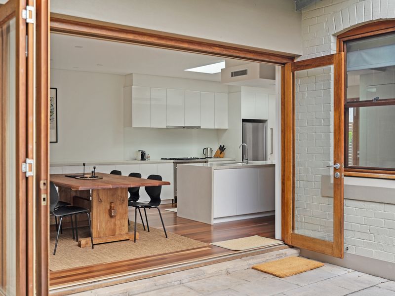 Bright dining area with a seamless connection to the outdoors.