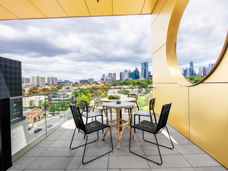 Relax on the balcony and enjoy city views with a morning coffee.