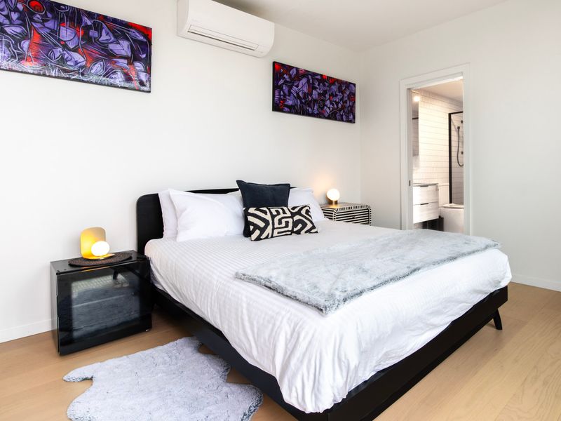 Peaceful Master bedroom retreat with bright and airy ambiance.