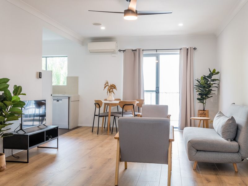 Well-lit living and dining space