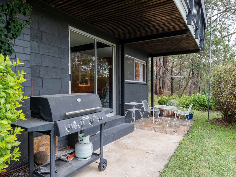 Outdoor living at its finest. Enjoy grilling and relaxing on this patio.