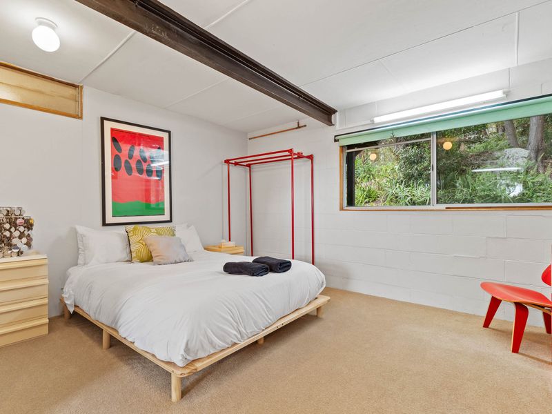 A cozy and stylish bedroom, perfect for a relaxing getaway.