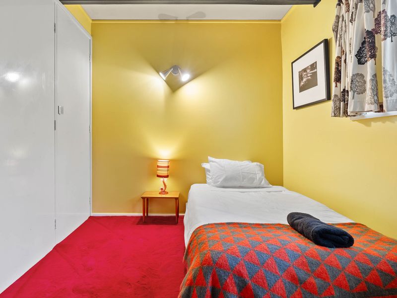 Peaceful single bedroom with fresh linens.