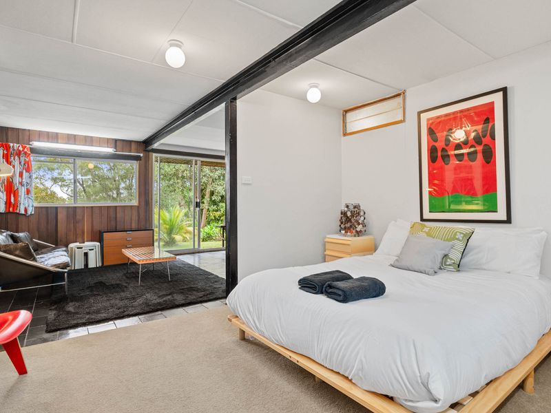 Bedroom with its own cozy living space for added comfort.
