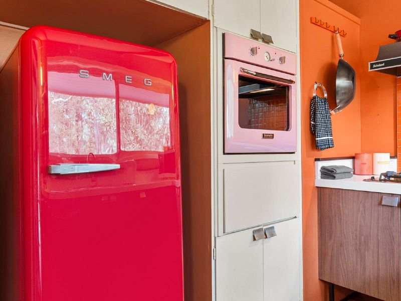 Retro vibes in a modern kitchen. A pop of color in a classic design.