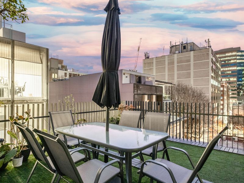 Dining al fresco with a skyline view.