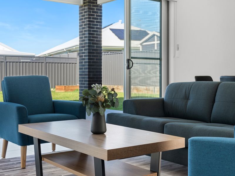 Cozy Living Area with Blue Sofa