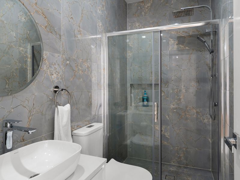 Modern Bathroom with Sink and Bath/Shower Area