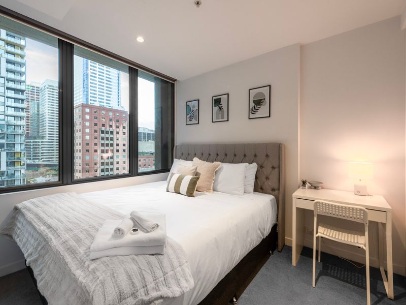 Bedroom with a city view