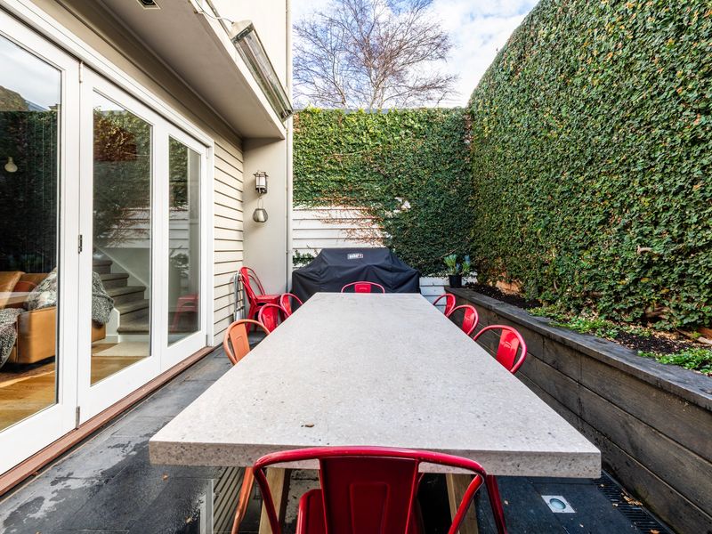 Chic Outdoor Dining with a Peek Indoors