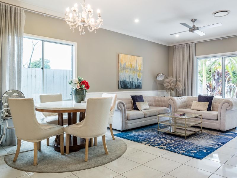 Open-plan living and dining area is designed for quality time with loved ones