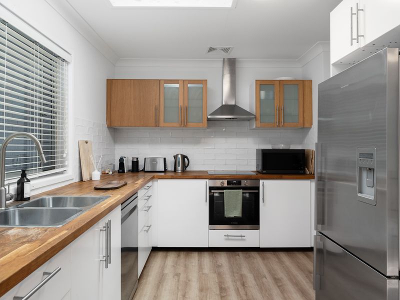 White and Wood-Toned Kitchen Space