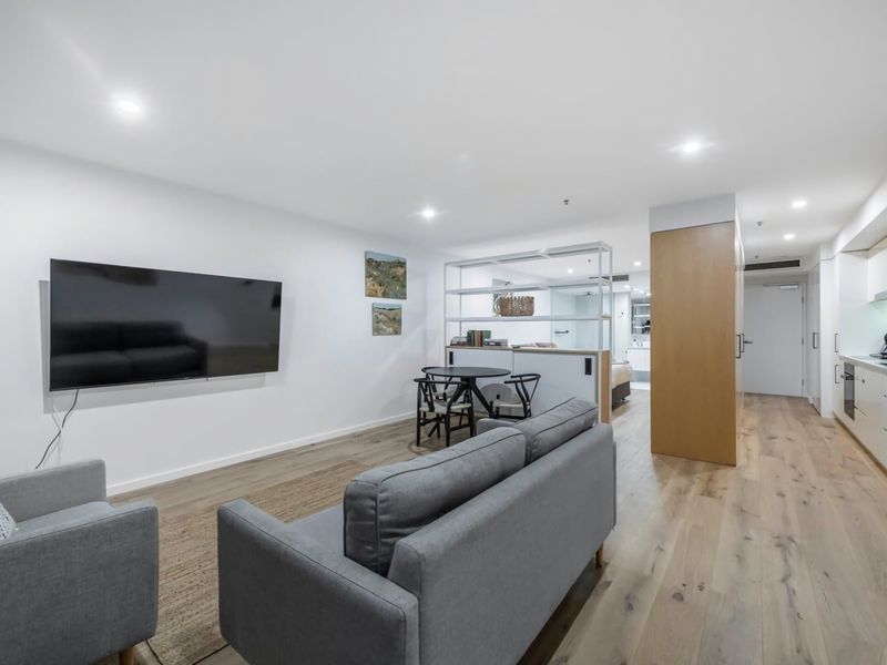 seamlessly blends into the kitchen and dining area