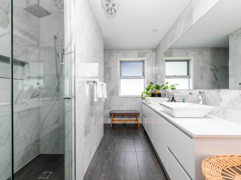 Spacious bathroom with glass shower