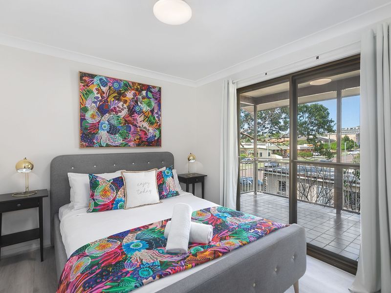 Upstairs queen bedroom with access to a private deck