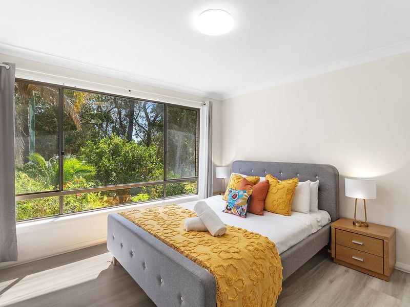 Upstairs Queen Master Bedroom with a Private Ensuite Bathroom.