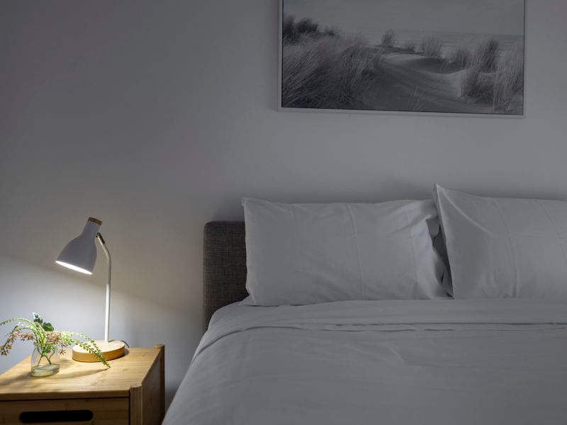 Calming master bedroom with grey tones and soft light