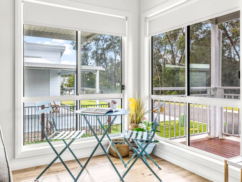 Cozy lounge corner with soft lighting and neutral tones