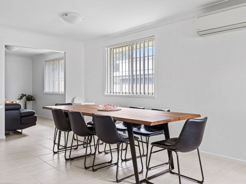 Large dining table ideal for family meals or group stays