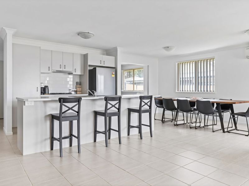 Open-plan kitchen and dining with modern finishes