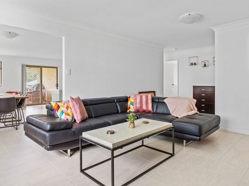 Bright and welcoming living area with comfortable seating