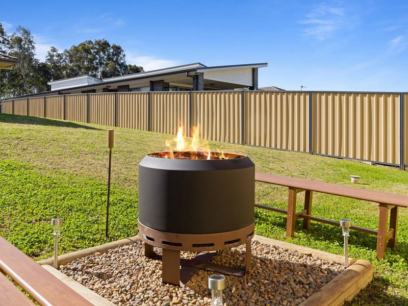 Private backyard with fire pit—perfect for evening gatherings