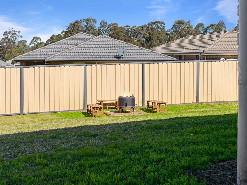Expansive grassy yard ideal for families and outdoor play