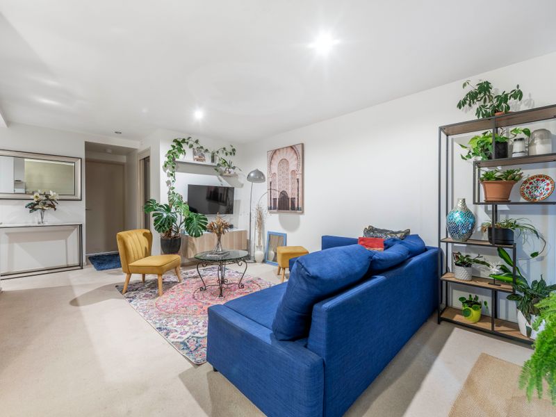 Bright living space with smart TV and designer touches