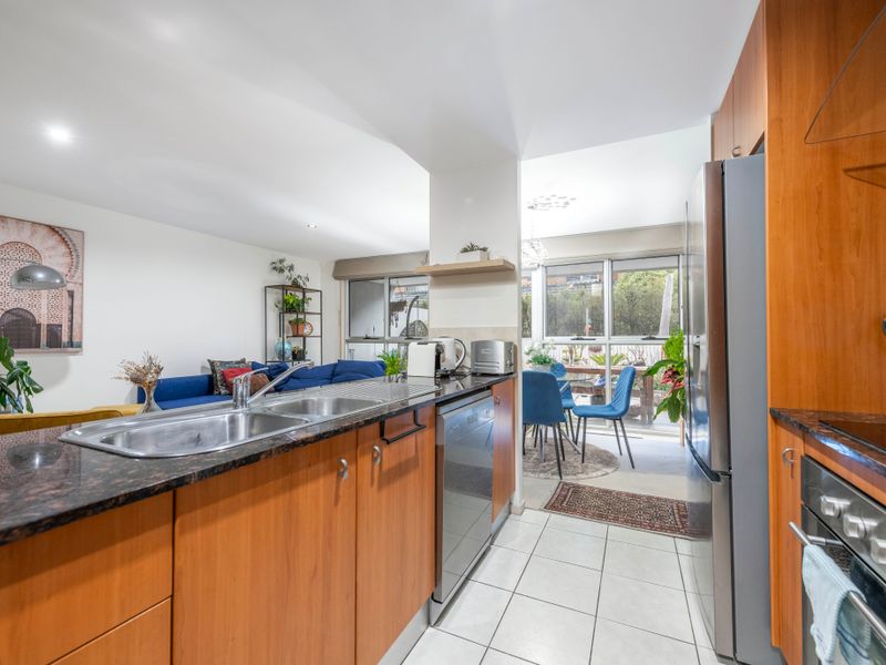 Open-plan kitchen and dining designed for comfort and style