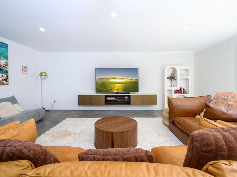 Spacious living room with modern comforts.