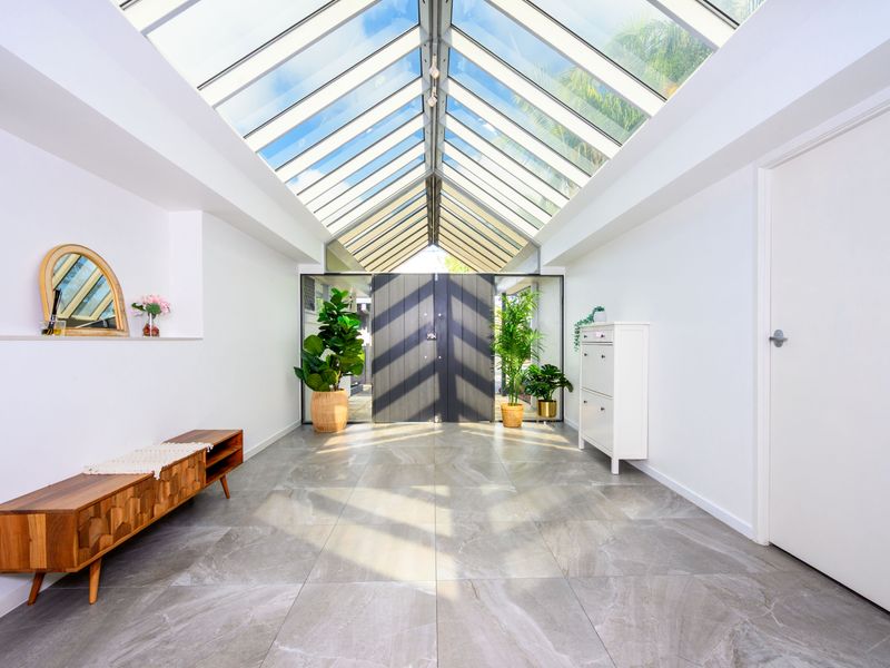 Sunlit entryway with modern design