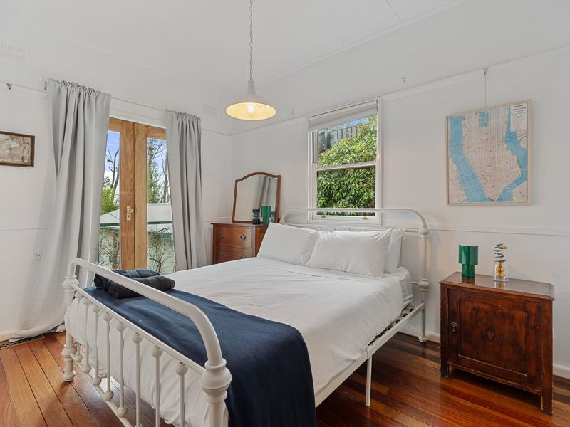 Peaceful queen bedroom designed for restful nights.