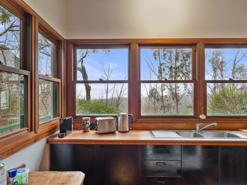 Kitchen with a lovely outlook over the surrounding greenery.