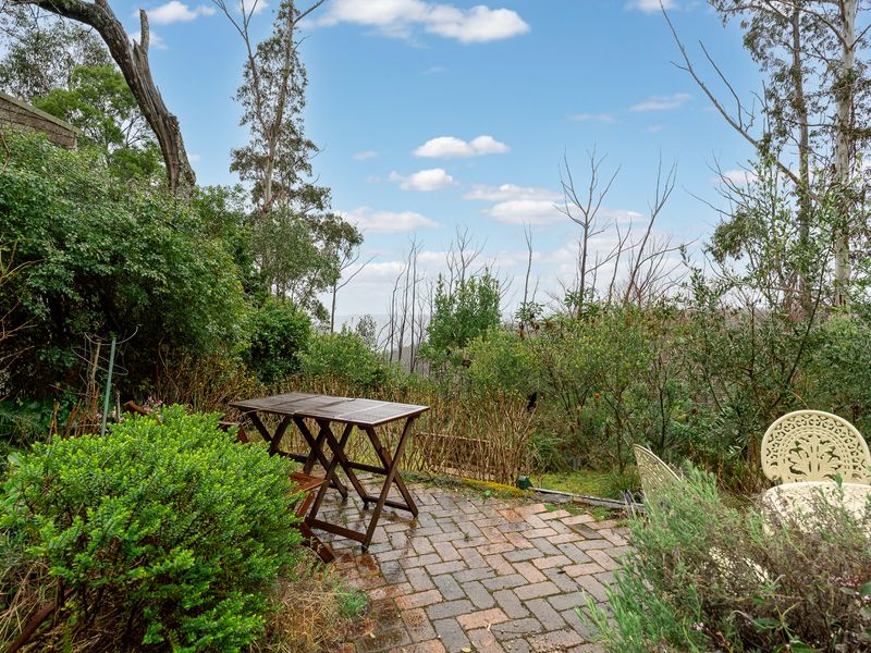 Outdoor seating area overlooking the nearby natural surrounds.