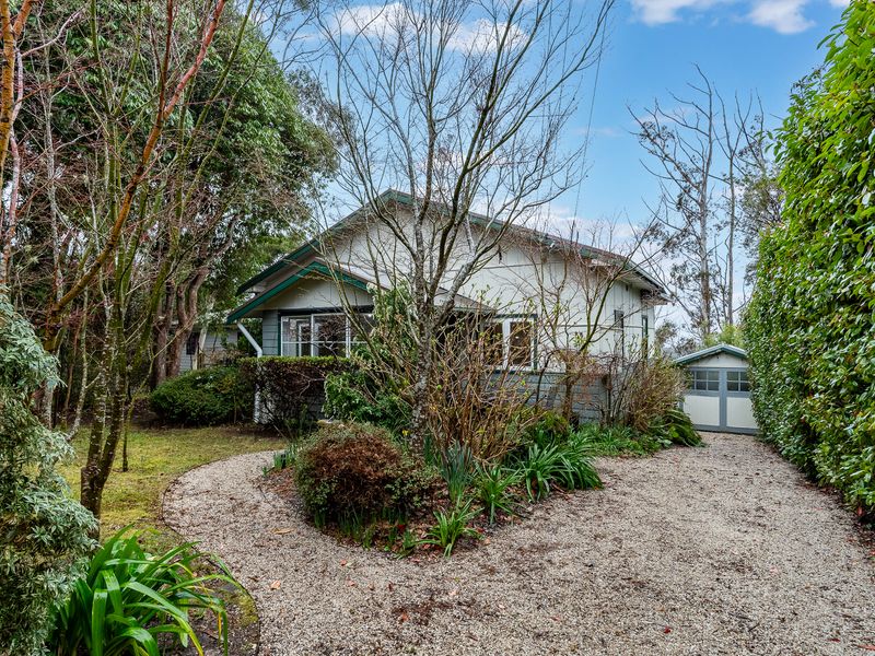 Discover the beauty of quiet living in this charming abode.