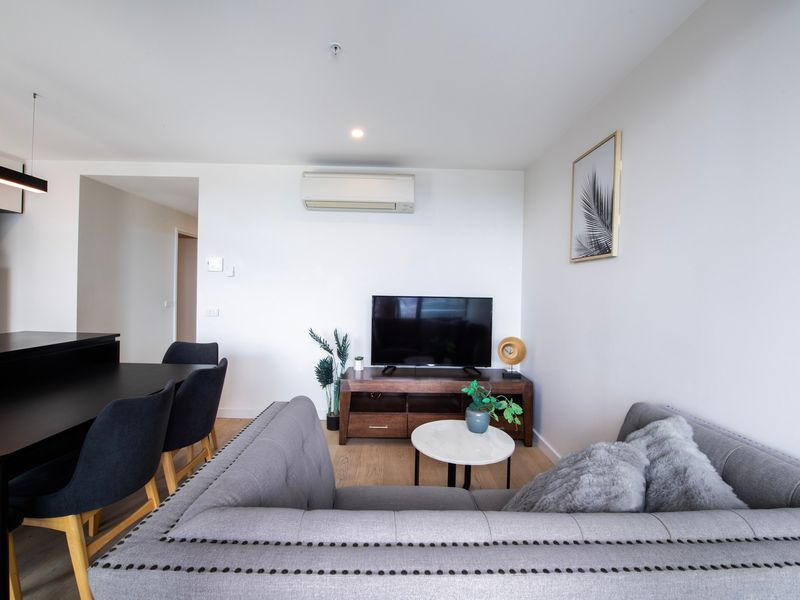 Bright and inviting living area perfect for relaxing after a day in the city