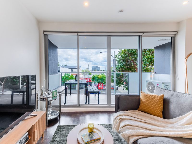 Cozy lounge with a stylish couch, perfect for reading or unwinding after a day of exploring.