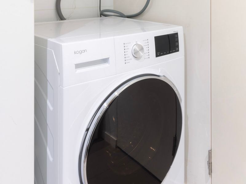 Washer and dryer unit conveniently located in the apartment, making laundry tasks easy and efficient.