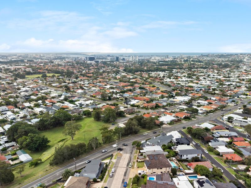 Wide aerial view capturing the home’s central location